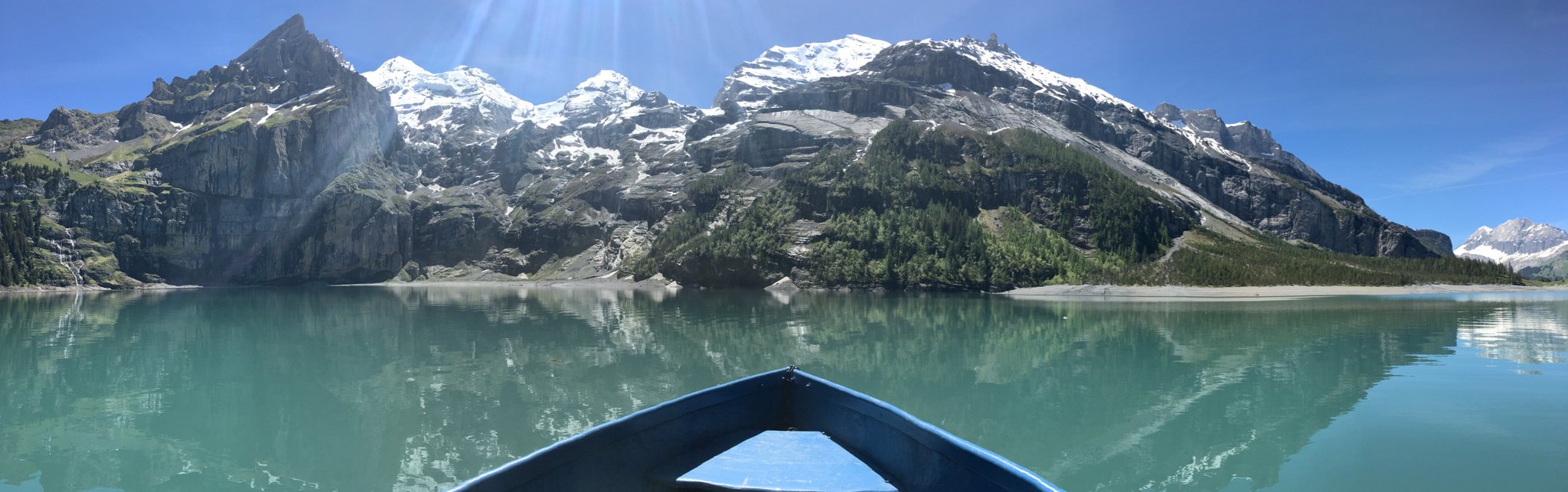 On a boat in the middle of Oeschinensee